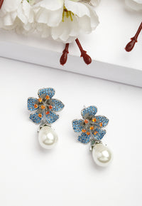 Boucles d'oreilles pendantes florales en zircone